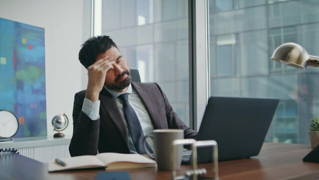 Desperate businessman looking laptop reading bad news close up. Unhappy manager