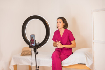 Specialist nutrition doctor records an online video at home
