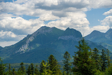 Scenic views from the heart of the Tatra Mountains, featuring the enchanting Polana Rusinowa, the picturesque Gęsia Szyja, and the breathtaking Hala Gąsienicowa. Explore the serene beauty. © Tomasz
