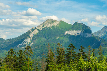 Scenic views from the heart of the Tatra Mountains, featuring the enchanting Polana Rusinowa, the picturesque Gęsia Szyja, and the breathtaking Hala Gąsienicowa. Explore the serene beauty.