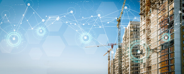 Construction technology banner background. Construction site with cranes, fittings and concrete.