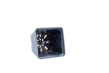 Rectangular plastic container for plants with drainage holes on isolated white background