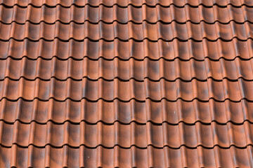 Red tiles roof background