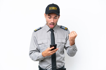 Young safeguard man over isolated white background surprised and sending a message