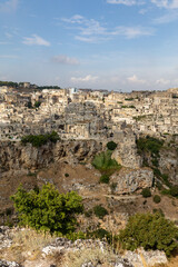 Panoramic view of Sassi di Matera a historic district in the city of Matera, well-known for their ancient cave dwellings from the Belvedere di Murgia Timone,  Basilicata, Italy