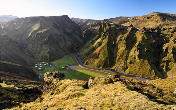 Top view of Thakgil campsite at sunset (&THORN;akgil Camping Ground) located in a beautiful valley, surrounded by mountains, 20 km from V&iacute;k, Iceland.