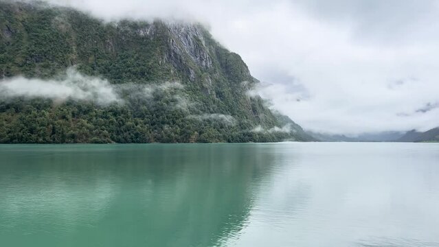 A scene of a very rainy day at Oldevatnet Lake and the Briksdal Valley, Norway