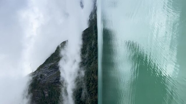 A scene of a very rainy day at Oldevatnet Lake and the Briksdal Valley, Norway