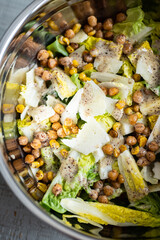 Fresh salad with lettuce hearts, smoked fish, roasted chick peas