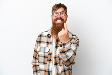 Redhead man with long beard isolated on white background doing coming gesture