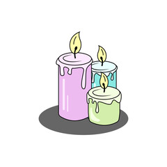 Beautiful multi-colored candles with burning wicks.