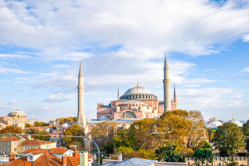 Fototapeta na wymiar Ayasofya Museum, Hagia Sophia in Sultan Ahmet park in Istanbul, Turkey in a beautiful autumn day. Byzantine architecture, city landmark and architectural world wonder