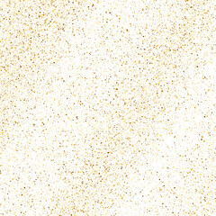 Gold glittering dust on white backdrop