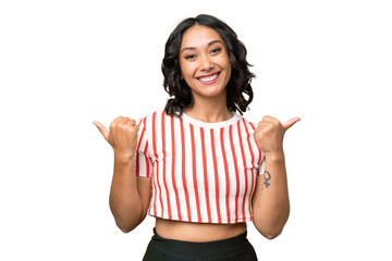 Young Argentinian woman over isolated background with thumbs up gesture and smiling - obrazy, fototapety, plakaty