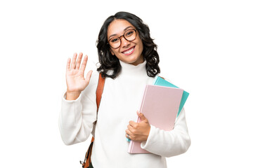 Young Argentinian student woman over isolated background saluting with hand with happy expression