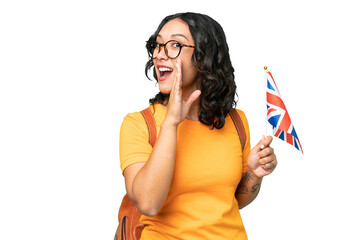 Young Argentinian woman holding an United Kingdom flag over isolated background whispering something