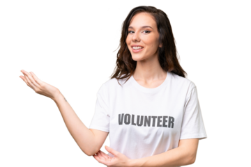 Young volunteer caucasian woman over isolated background extending hands to the side for inviting to come