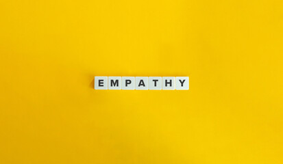 Empathy (Feeling As Another) Word and Concept Image. Letter Tiles on Yellow Background. Minimal Aesthetic.
