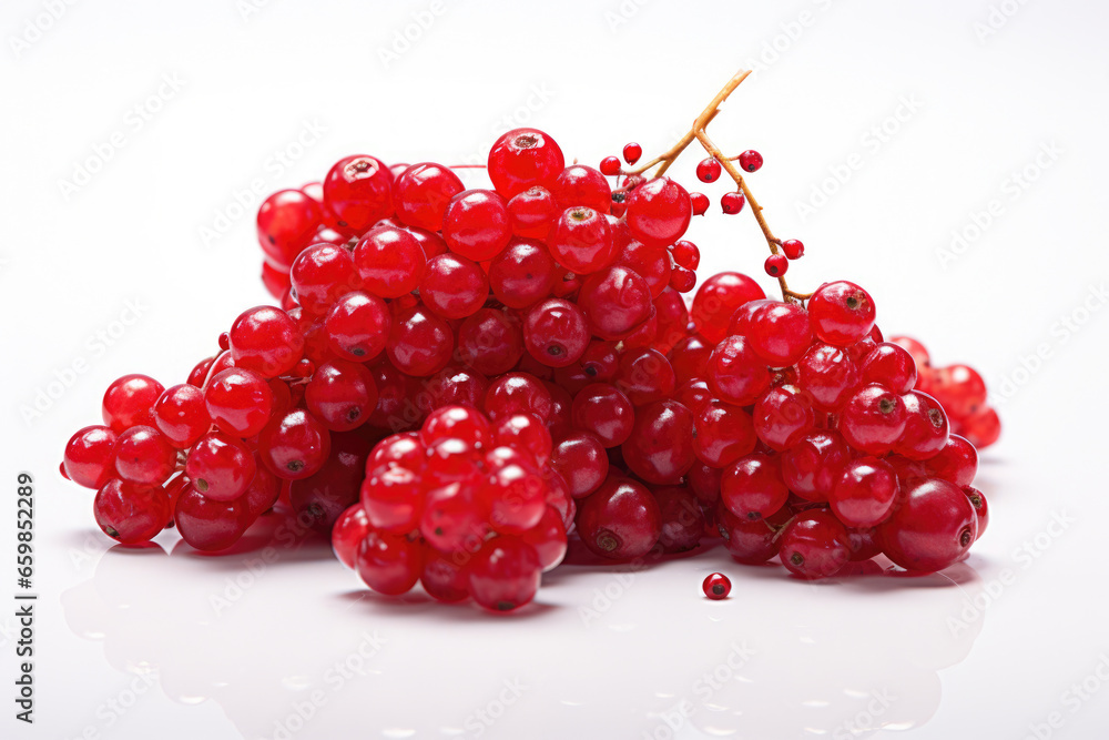 Poster pile of red berries arranged on clean, white surface. this image can be used to add touch of freshne