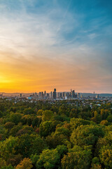 sunset over the city in German. Golden hour in Frankfurt am Main with yellow and blue clouds