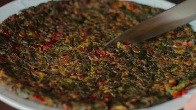 Omelette with lots of vegetables, Kaygana, a traditional dish of Turkish cuisine.