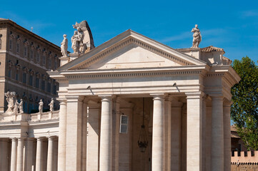 Facade of St. Peter's Basilica with Statues of saints in the Vatican, Rome, Italy