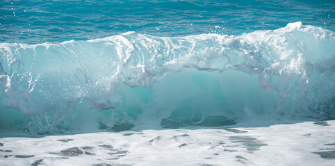 Refreshing sea wave crashing on the coast