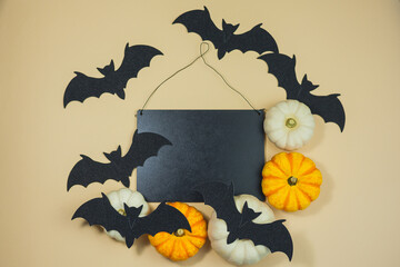 Halloween. Decor for the autumn holidays. Small pumpkins. Background. Fall.