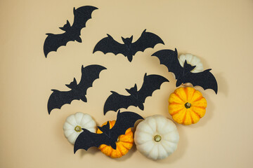 Halloween. Decor for the autumn holidays. Small pumpkins. Background. Fall.