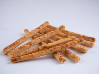 Cheese Sprinkle Stick Cookies are neatly presented and isolated against a white background.