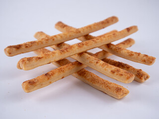 Cheese Sprinkle Stick Cookies are neatly presented and isolated against a white background.