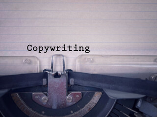 Business, communication and social issue concept. Copywriting written on a paper. With blurred styled background.