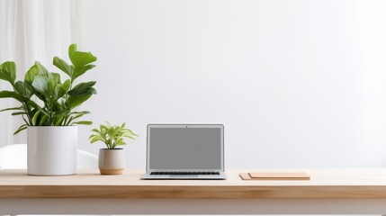 A laptop adorns a minimalist office desk, bathed in soothing natural light.