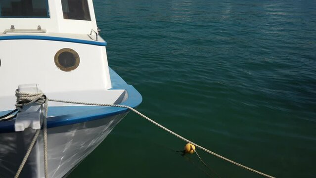 Single blue and white fishing boat in harbour, Kos Town, Kos, Dodecanese, Greek Islands
