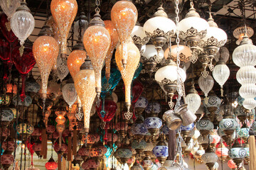 Vibrant colorful ceramic artifact, glass lamps for sell in  a pavalion, Global village, Dubai, UAE