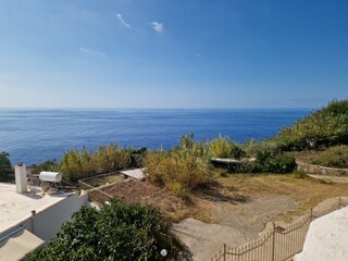 Obraz premium The beautiful Ventotene Island: Colorful Houses, Boats, and a Wonderful Sea. Popular island in the mediterranean near to Formia, Ponza and Ischia in Italy