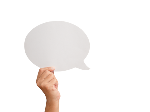 Close-up of hand holding a blank white speech bubble while standing against a transparent background
