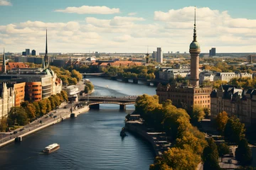 Küchenrückwand glas motiv Stockholm a river with a bridge over it and a clock tower