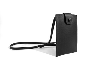 women's black leather handbag with white background