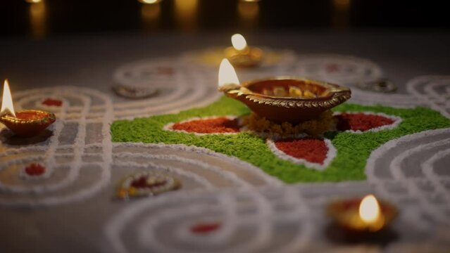 Clay diya lamps lit during diwali celebration, Diwali, or Deepavali, is India's biggest and most important holiday.