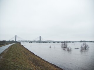 bridge over a flooded river