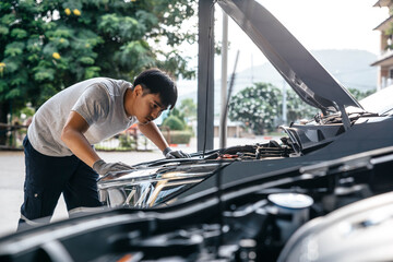Mechanic technical check of auto at garage workshop, Car auto services and maintenance check...