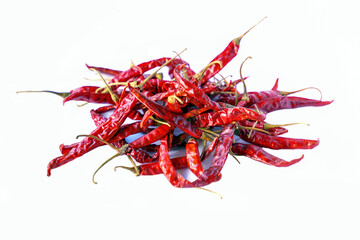 Dried chilies on a white background are herbal plants, a flavoring in processed foods derived from...