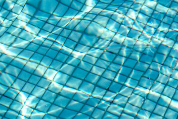 Obraz premium Abstract beautiful ripple wave and clear turquoise water surface in swimming pool, Turquoise or blue water wave for background and abstract