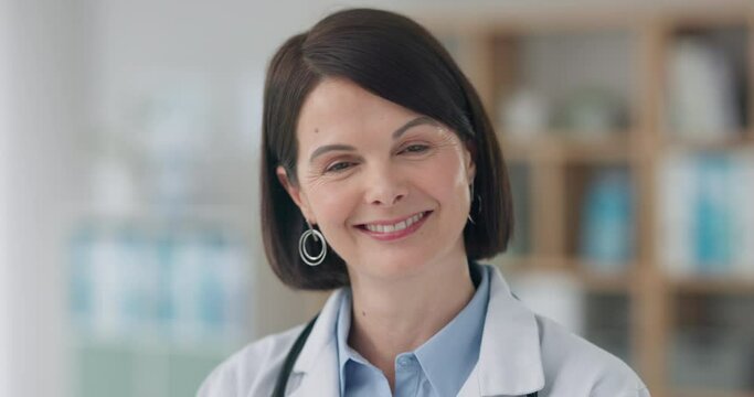 Woman, surgeon and face of doctor in office with confidence in cardiology, medicine and healthcare. Medical, worker and portrait in London hospital with professional health care and service in clinic