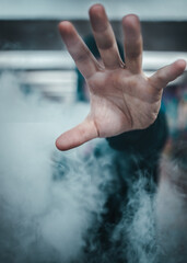 hand and smoke
