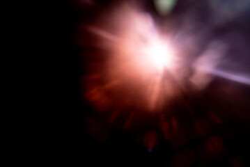Abstract Natural Sun flare on the black