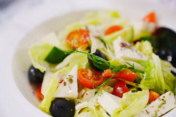 Vegetable salad with cheese. Traditional Greek salad recipe. 