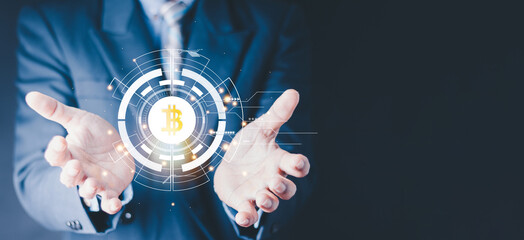 Businessman holding coins of modern cryptocurrency metaverse finance .Digital bitcoin and crypto currency network, Blockchain and NFT technology trade and exchange financial innovation futuristic.