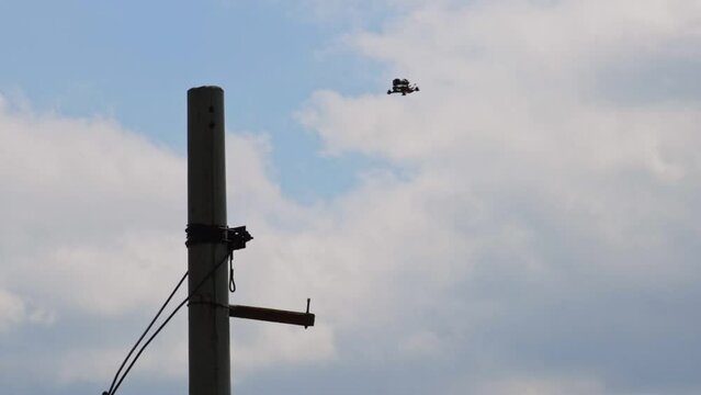FPV unsuccessfully lands on a pole, falls to the ground